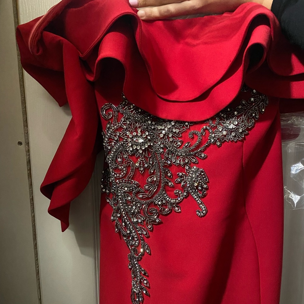 Size 4 red gown with jewels.